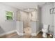 Modern bathroom featuring a glass-enclosed shower with tiled walls and floors at 730 Cordova Dr, Orlando, FL 32804