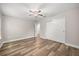Bedroom featuring hardwood floors, closet, and ceiling fan at 730 Cordova Dr, Orlando, FL 32804