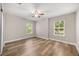Bedroom featuring hardwood floors and dual windows at 730 Cordova Dr, Orlando, FL 32804