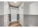 Spacious walk-in closet with ample shelving and drawer storage for optimal organization at 730 Cordova Dr, Orlando, FL 32804