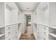 Walk-in closet with custom built-in shelving and drawers, providing ample storage space at 730 Cordova Dr, Orlando, FL 32804