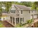 Two-story home boasting a charming front porch with white columns and a brick-paved walkway at 730 Cordova Dr, Orlando, FL 32804