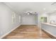 Bright living room with hardwood floors, ceiling fan, and sliding glass doors at 730 Cordova Dr, Orlando, FL 32804