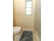 Bathroom featuring a standard toilet and a shower with a shower curtain and a window for light at 854 Escabar Dr, Altamonte Springs, FL 32714