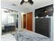 Bedroom with mirrored closet doors, a TV mounted above a dresser, and a ceiling fan at 854 Escabar Dr, Altamonte Springs, FL 32714