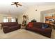 Open-concept living room connected to the kitchen and dining area for easy entertaining at 854 Escabar Dr, Altamonte Springs, FL 32714
