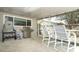 Outdoor patio area with a grill, seating, and a view of the backyard at 854 Escabar Dr, Altamonte Springs, FL 32714