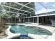 Screened-in pool with a view of the lanai, promising a private and refreshing oasis at 854 Escabar Dr, Altamonte Springs, FL 32714
