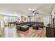 Large game room featuring a foosball table and leather sectional couch at 8808 Macapa Dr, Kissimmee, FL 34747
