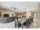 Open-concept living space with dining area, kitchen, and living room, perfect for entertaining at 8808 Macapa Dr, Kissimmee, FL 34747
