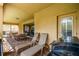 Covered patio with lounge chairs, a barbecue, brick tiles and views of the yard at 8808 Macapa Dr, Kissimmee, FL 34747