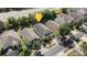Aerial view of a single Gathering home, surrounded by trees and manicured lawns at 9723 Pecky Cypress Way, Orlando, FL 32836