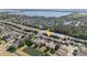 Aerial view of the neighborhood, with beautiful ponds and mature trees at 9723 Pecky Cypress Way, Orlando, FL 32836