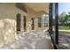 Screened patio with view of the yard at 9723 Pecky Cypress Way, Orlando, FL 32836