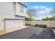 Attached two-car garage with extra parking and a manicured landscape provides convenience and curb appeal at 1010 Lychee Ct, Lake Mary, FL 32746