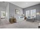 This living room is bright and airy, with plenty of space to relax and entertain, and stylish plantation shutters at 1010 Lychee Ct, Lake Mary, FL 32746