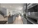 Stylish kitchen with stainless appliances, sleek countertops, and an adjacent dining area at 10133 Merrymeeting Bay Dr, Winter Garden, FL 34787