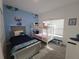 The bedroom features a cozy twin bed and a bunk bed with a Stitch theme at 1036 Leader Street, Davenport, FL 33896