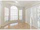 Bright breakfast nook with a set of sunlit windows and tile floors at 1040 Hamlet Dr, Maitland, FL 32751