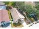 Aerial view of a single-Gathering home with a well-maintained yard and charming exterior details at 1040 Hamlet Dr, Maitland, FL 32751