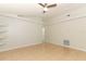Bright living room features tile floors, a ceiling fan, and natural light at 1040 Hamlet Dr, Maitland, FL 32751