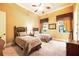 Cozy bedroom with twin beds, neutral tones, and matching window treatments at 11055 Ullswater Ln, Windermere, FL 34786