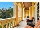 Inviting covered patio with comfortable seating and views of the surrounding landscape at 11055 Ullswater Ln, Windermere, FL 34786