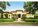 Stunning Mediterranean home with manicured landscaping and a tile roof at 11055 Ullswater Ln, Windermere, FL 34786