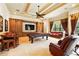 Spacious game room includes a pool table, custom built-ins, and comfortable seating at 11055 Ullswater Ln, Windermere, FL 34786