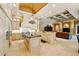 Large, open kitchen with custom cabinetry, a center island, and a seamless transition to the living area at 11055 Ullswater Ln, Windermere, FL 34786