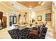 Beautiful living room with custom ceiling, travertine floors and French doors at 11055 Ullswater Ln, Windermere, FL 34786