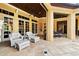 Inviting outdoor space with cozy seating, perfect for relaxing and entertaining guests at 11055 Ullswater Ln, Windermere, FL 34786
