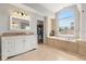 Bright bathroom with walk in closet, soaking tub, large vanity and lots of natural light at 1128 Brantley Estates Dr, Altamonte Springs, FL 32714