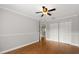 Clean and bright bedroom with beautiful wood floors and double closet at 1128 Brantley Estates Dr, Altamonte Springs, FL 32714