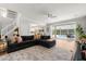 Spacious living area connecting to kitchen, featuring hardwood floors and natural light at 1128 Brantley Estates Dr, Altamonte Springs, FL 32714