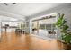Expansive living area flowing into the modern kitchen and leading to the pool area at 1128 Brantley Estates Dr, Altamonte Springs, FL 32714