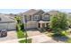 Beautiful home features a two-car garage, manicured lawn and established landscaping in a desirable neighborhood at 12048 Imaginary Way, Orlando, FL 32832