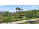 Community park featuring a multi-level viewing tower, picnic area, and walking paths at 12048 Imaginary Way, Orlando, FL 32832