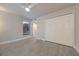 Bedroom with ceiling fan, closet and wood-look tile flooring at 1270 Saint Tropez Cir # Ge, Orlando, FL 32806