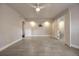 The bedroom features wood-look floors, white walls, and multiple doors, creating a bright and airy space at 1270 Saint Tropez Cir # Ge, Orlando, FL 32806