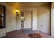 Brick tiled condo entrance with a patterned front door, sidelight, and exterior light at 1270 Saint Tropez Cir # Ge, Orlando, FL 32806