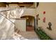 A condo entrance with stairs leading up to the front door that is behind an iron gate at 1270 Saint Tropez Cir # Ge, Orlando, FL 32806