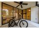 View from the enclosed lanai through sliding glass doors into another living space at 1270 Saint Tropez Cir # Ge, Orlando, FL 32806