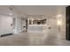 Spacious living area featuring tile flooring, an open layout, and access to the foyer at 1270 Saint Tropez Cir # Ge, Orlando, FL 32806
