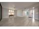 Open-concept living room boasting ample space, modern lighting, and neutral color palette at 1270 Saint Tropez Cir # Ge, Orlando, FL 32806