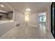 The living room is next to an updated kitchen and has wood-look tile flooring at 1270 Saint Tropez Cir # Ge, Orlando, FL 32806
