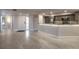 Bright living room with tile flooring, access to the entryway, and open access to the kitchen at 1270 Saint Tropez Cir # Ge, Orlando, FL 32806