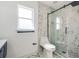 Updated bathroom featuring modern fixtures, tiled shower, and white marble-style accents at 13208 Canna Lily Dr, Orlando, FL 32824