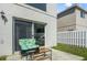 Back patio area with furniture visible through sliding glass doors of home at 13208 Canna Lily Dr, Orlando, FL 32824