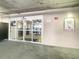 Interior view of building entrance and elevators at 13427 Blue Heron Beach Dr # 1205, Orlando, FL 32821